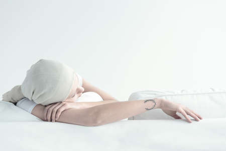 Artistic photo of woman tired by cancer treatment