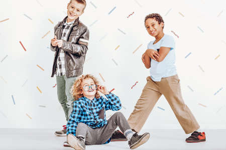 Young happy boys smiling and playing togetherの写真素材