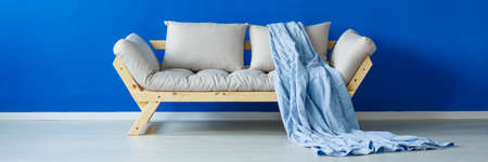 Minimalism and blue wall in living roomの写真素材