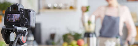 Taking a picture of a healthy smoothie preparation