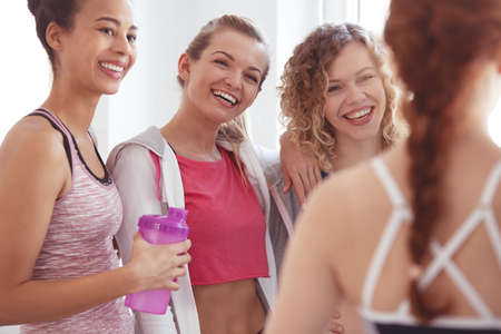 Girls taking a break during  dancing marathonの写真素材