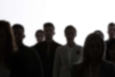 Crowd of people silhouettes standing on white background