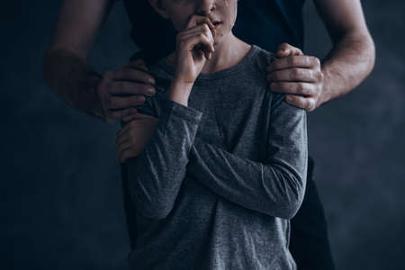 Heartbreaking photo of crying boy abused by his father