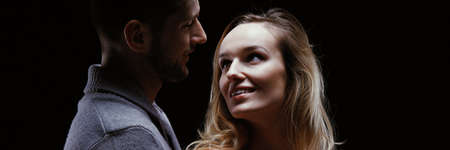 Panorama of intimate couple's embrace full of love and respectの写真素材