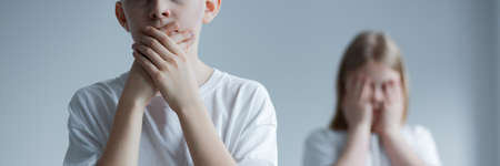 Pair of children being scared of what is to come