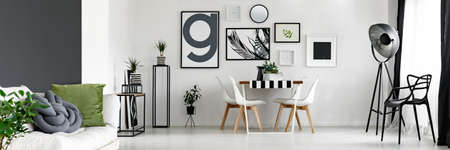 Minimalist room with posters gallery on the wall