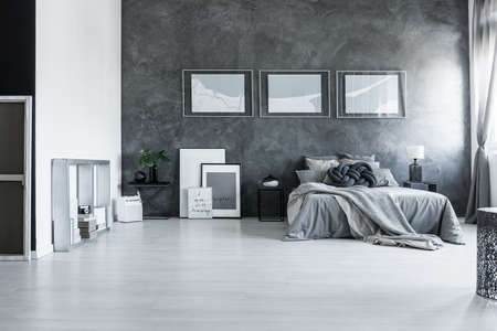 Contemporary gray bedroom with stylish design and modern furnitureの写真素材