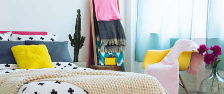 Modern folk mexican bedroom concept with bed and chair