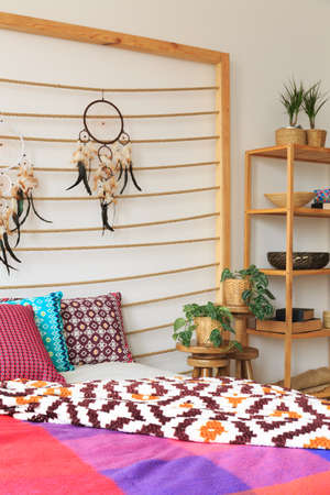 Bedroom decoration in ethnic ethereal multicolor styleの写真素材