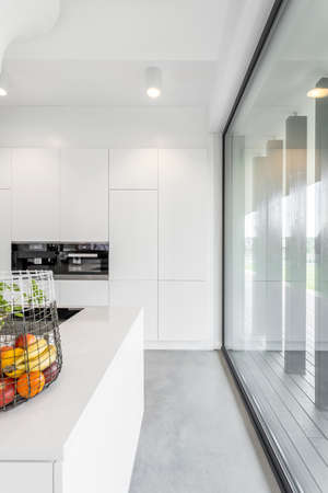 Interior of a minimalistic kitchen in a luxurious villaの写真素材