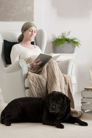 Bond between animal and human sick with cancerの写真素材