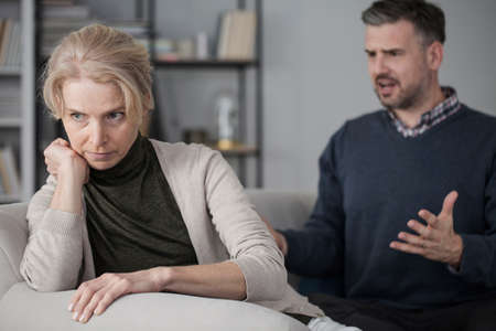 Wife refusing to listen to her nervous, screaming husband and giving him the silent treatment