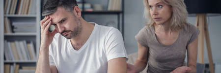 Offended husband and mad wife during conversation about divorceの写真素材