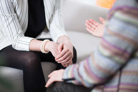 Close-up of corporate employee during a meeting with financial advisorの写真素材