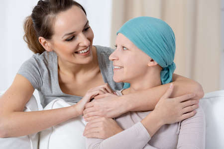 Sisters hugging each other showing supportの写真素材