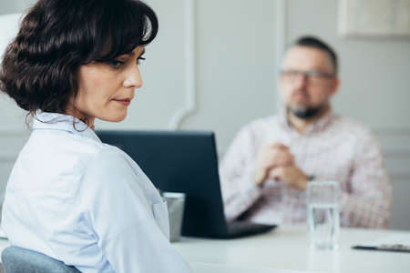 Miserable woman trying to find solutions for her problemsの写真素材