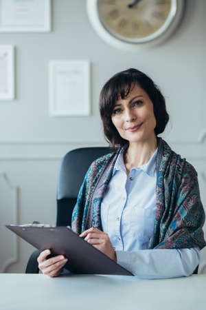 Vertical view of psychotherapist at her office