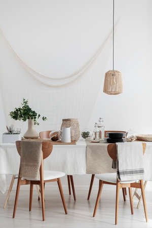 Real photo of modern white and beige living room interiorの写真素材