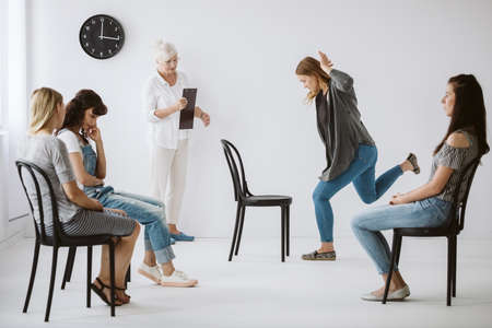 Four young women working in a group together