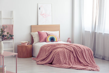 White and pastel pink scandinavian bedroom interior for kidの写真素材