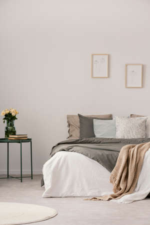 Vertical view of modern pastel bedroom interiorの写真素材