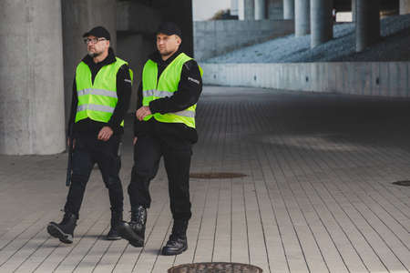 Two police officers on the daily patrol routineの写真素材