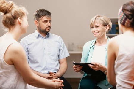 Group psychotherapy with professional counselor for people with anxiety problemsの写真素材