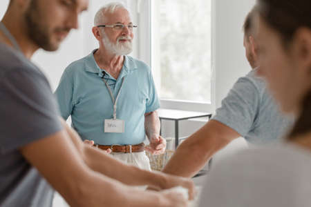 Group of people working together on bioenergy workshopsの写真素材