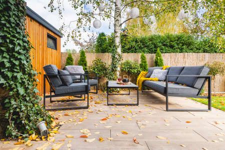 Gray furniture in the garden of elegant homeの写真素材