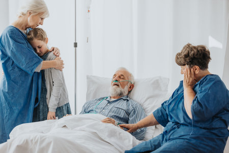 Senior sick man dying in hospital bedの写真素材
