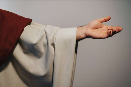 Close up of hand of Jesus Christ who is blessing the peopleの写真素材