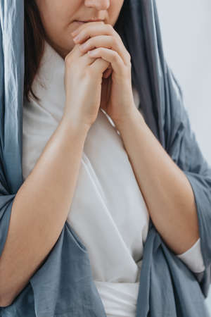 Virgin Mary praying to the Lord with humblenessの写真素材