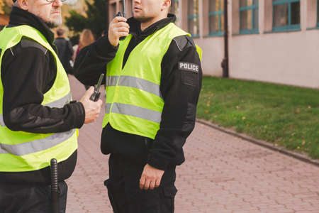 Police officers uphold law and order through the detection, prevention and investigation of crimeの写真素材