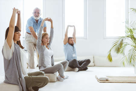 Group of young people getting rid of stress during bioenergy workshopsの写真素材