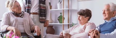 Senior friends spending time together in the retirement homeの写真素材