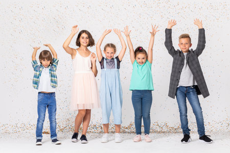 Group of cool children fooling around and making funny posesの写真素材