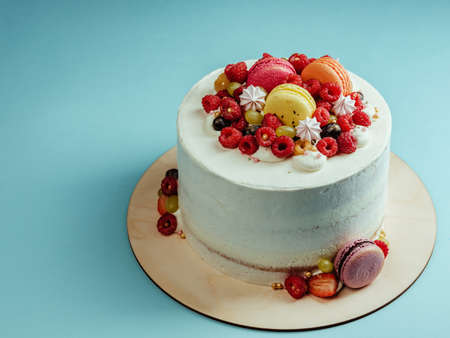 Naked cake with fresh berries on top
