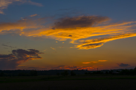 Dramatic sunset  sky, colorful cloudy sky, landscape  sky
Blue clouds diverge before the red sky
の写真素材