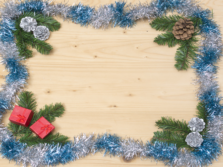 Festive Decoration and Fir branches on Wooden Christmas theme backgroundの写真素材