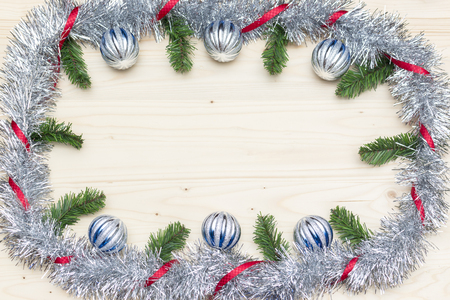 Festive Decoration and Fir branches on Wooden Christmas theme backgroundの写真素材