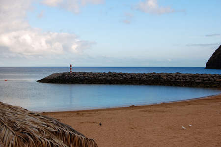 Beach and light house の写真素材