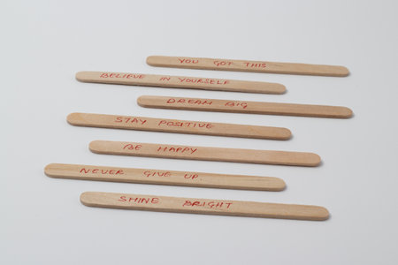Hand written positive quotes to boost people's self esteem.