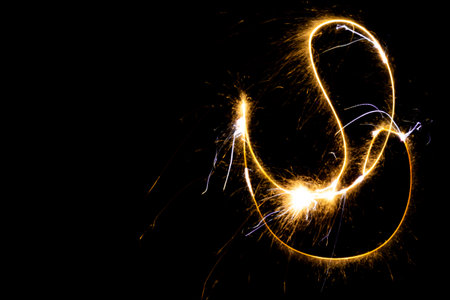 Light painting a lamp using crackers with long exposureの写真素材