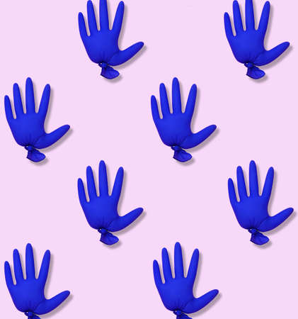 Blue medical glove shows stop gesture.Coronavirus outbreak.