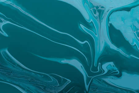 Monochrome marble background.Mixed nail polishes.Abstract stains of liquid nail lacquer.Creative hand painted background with brush strokes,part of acrylic painting.Texture, background, wallpaper.の写真素材