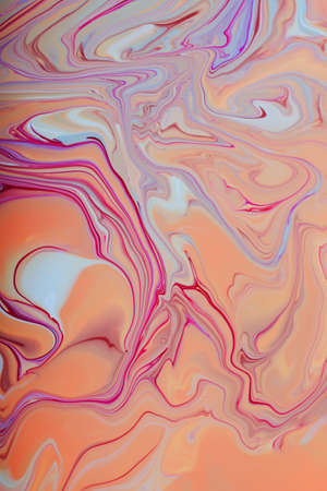Creative pastel marble background with abstract stains.Mixed liquid nail polishes.Modern make up backdrop.Fluid art technique.Copy space.Pour painting art work.Macro photography.Vertical banner.の写真素材