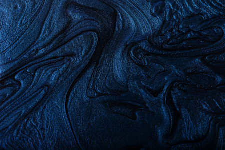 Marble blue shimmer abstract background. Make up concept.Beautiful stains of liquid nail...