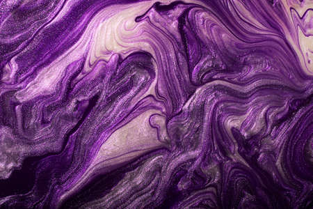 Abstract violet shimmer background.Make up concept.Beautiful stains of liquid nail laquers.Fluid...