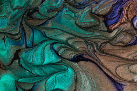 Beautiful shimmer turquoise stains of liquid nail polish.Stripy paint texture.Nail lacquer flow...