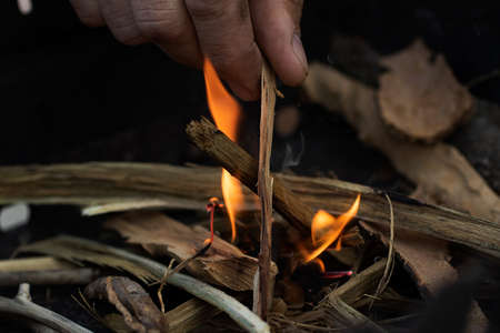 Man making fire,closeup photography of the hand.の写真素材